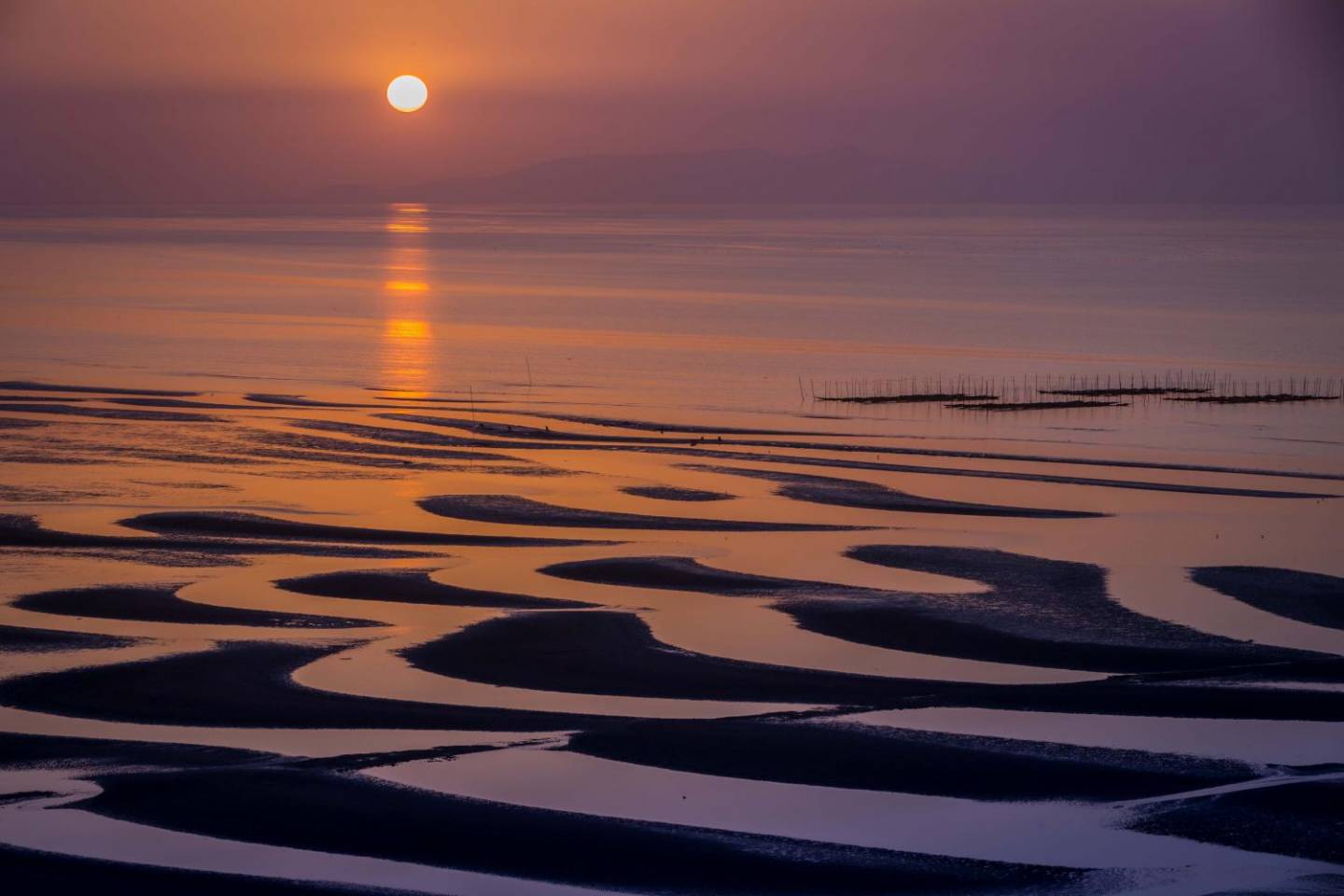 Sonnenuntergang an der Okoshiki-Küste