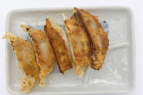 Gyoza (Hausgemacht mit Gemüse u. Koriander) 