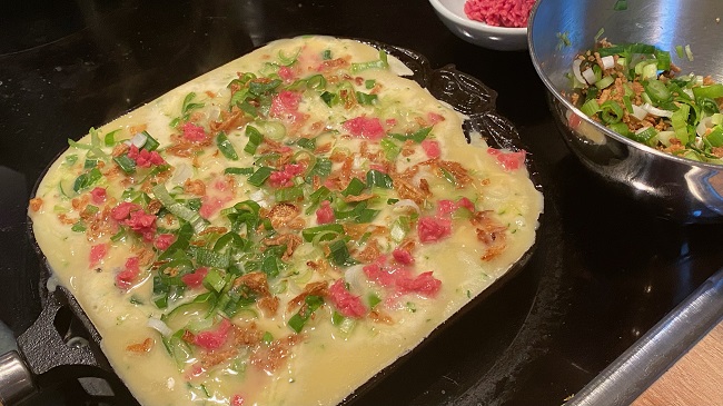 Takoyaki-Zubereitung in der Pfanne
