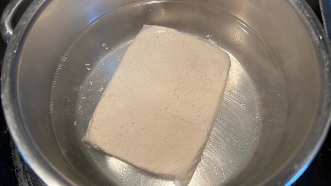 Tofu in Kochwasser